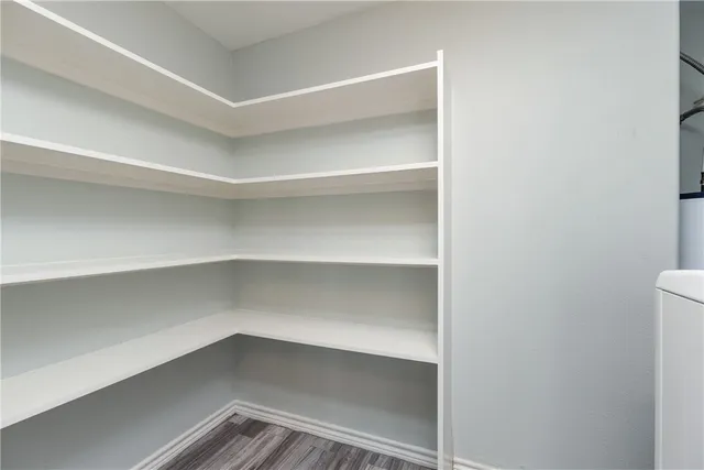 a view of an empty walk in closet