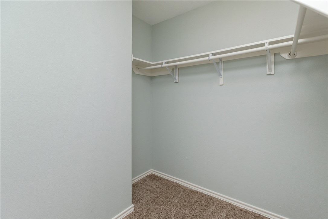 15409 Salt Cay Court, Unit F Corpus Christi, TX 78418 - Photo 24 of 35 a view of an empty walk in closet