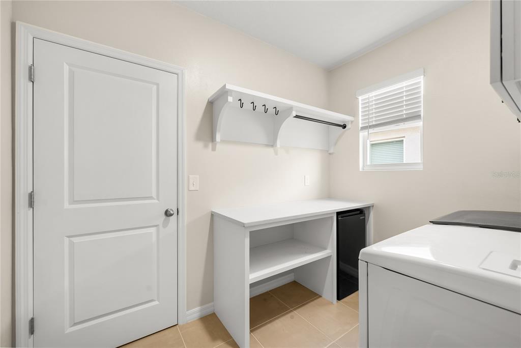 5021 Southwest 88th Street Ocala, FL 34476 - Photo 24 of 40 a utility room with dryer and washer