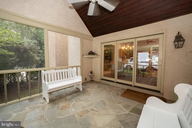 a view of a green field with lots of bushes