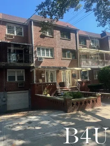 a front view of a house with parking