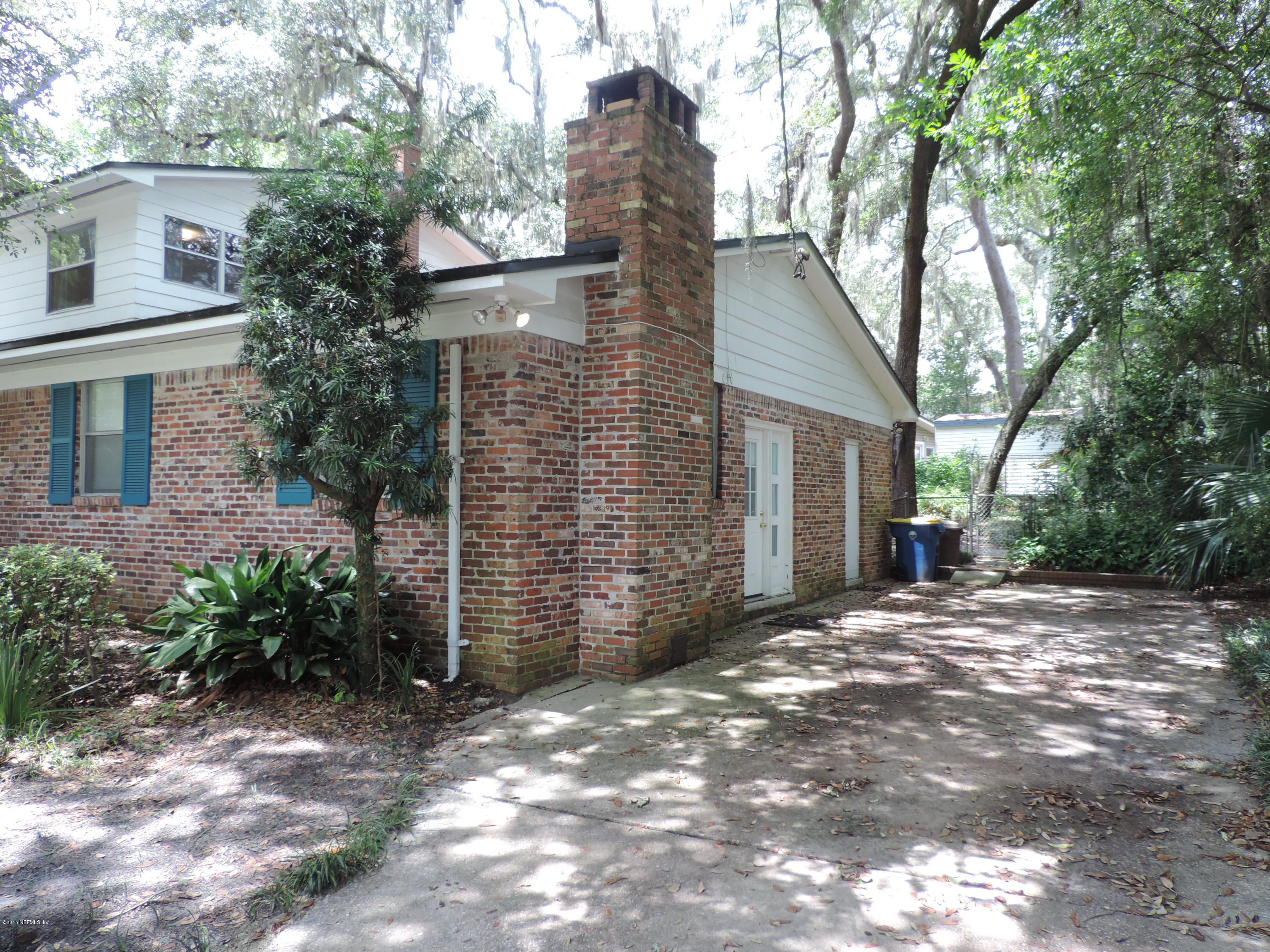 4006 Bess Road Jacksonville, FL 32277 - Photo 19 of 30 a view of a house with a trees