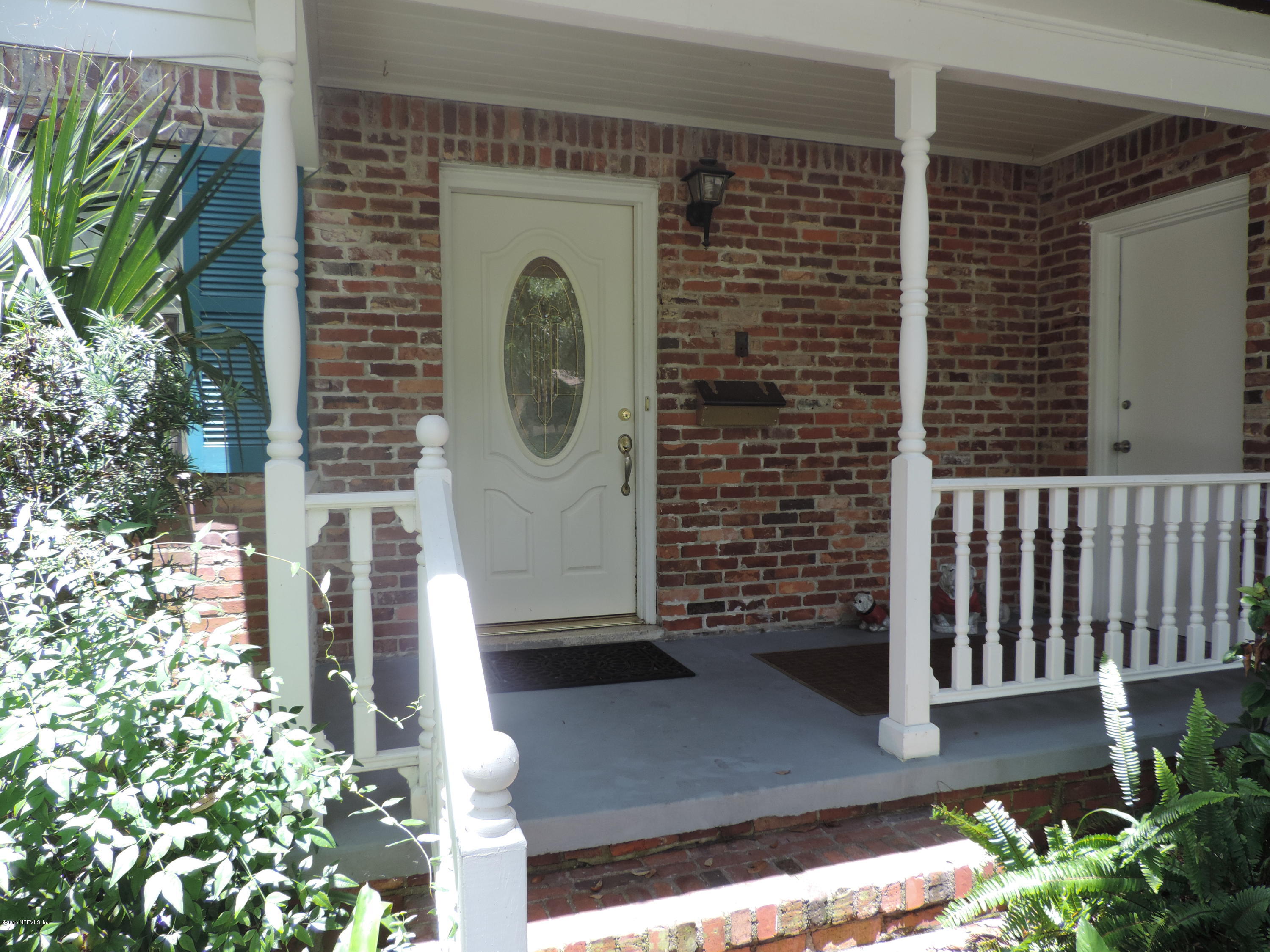4006 Bess Road Jacksonville, FL 32277 - Photo 3 of 30 a front view of a house with a yard