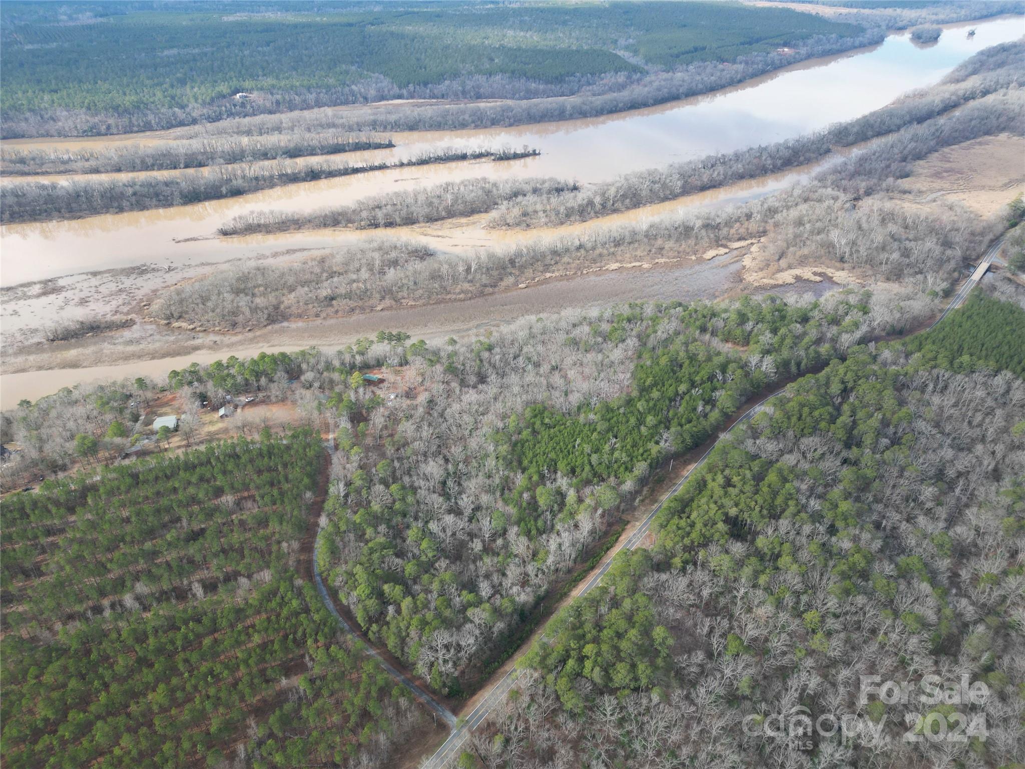Tbd Grassy Island Road Ellerbe, NC 28338 - Photo 12 of 38 a view of a yard with wooden fence