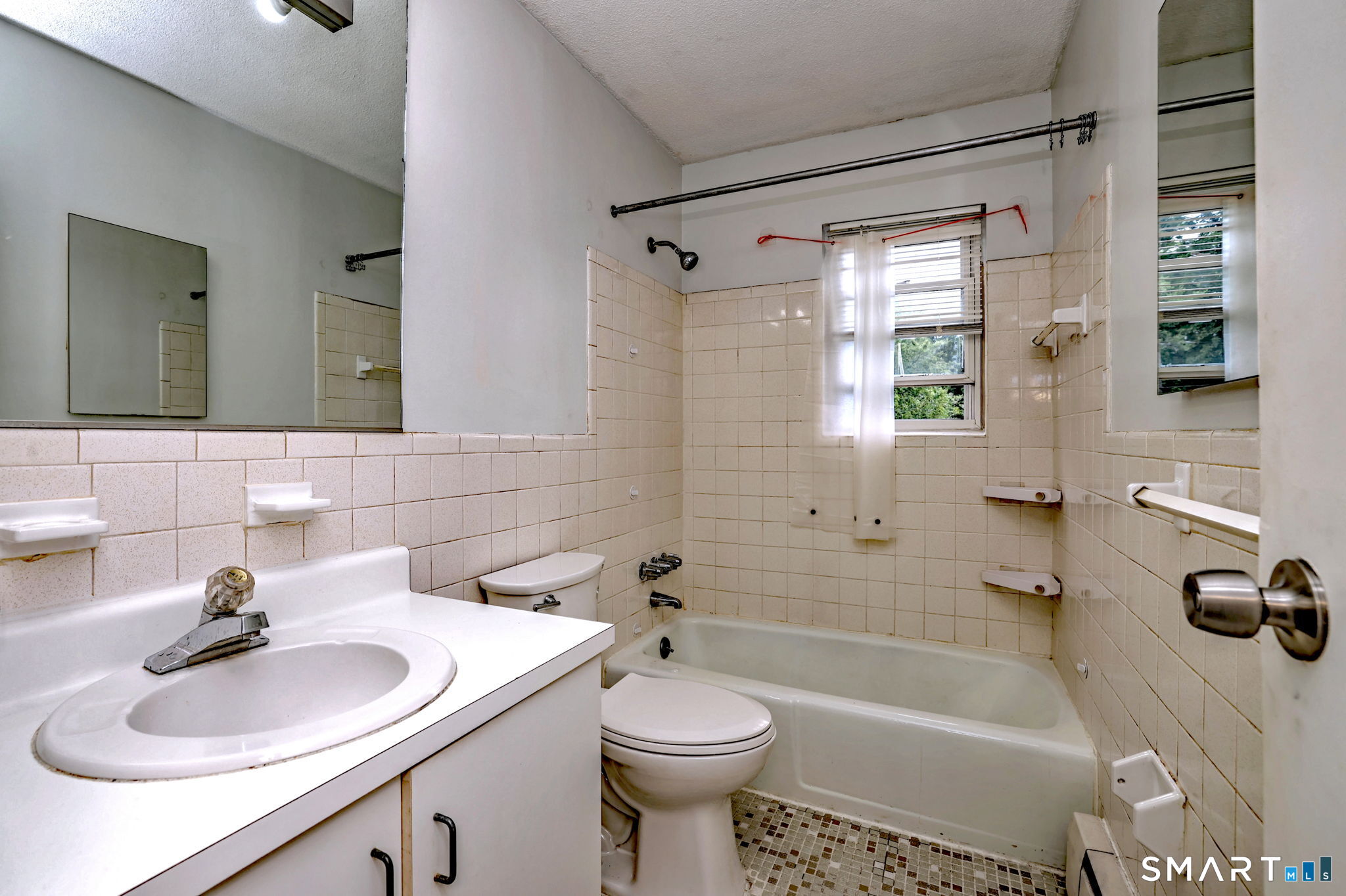 43 Balance Rock Road, Unit 11 Seymour, CT 06483 - Photo 30 of 40 a bathroom with a sink toilet and shower