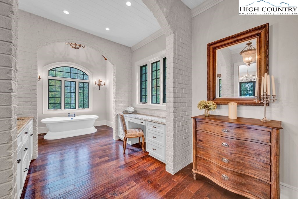 906 Fox Meadow Road Banner Elk, NC 28604 - Photo 19 of 40 a living room with furniture and a large window