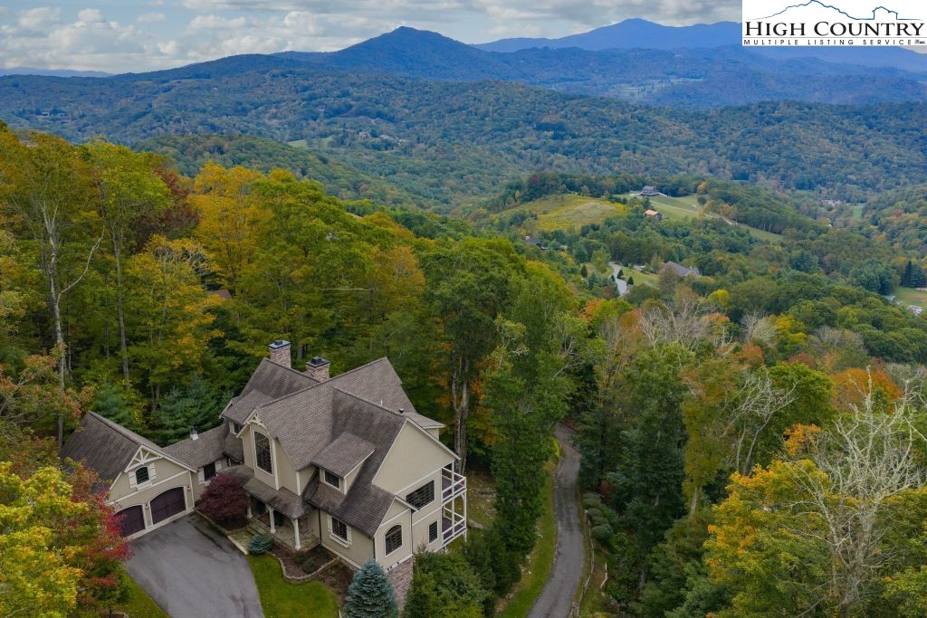 906 Fox Meadow Road Banner Elk, NC 28604 - Photo 39 of 40 an aerial view of residential house and sandy dunes