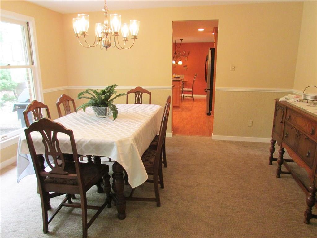 DINING ROOM - View of the dining room into the kitchen.