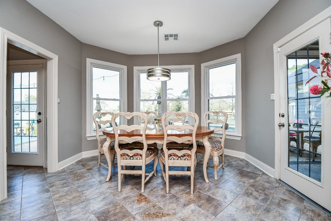 3680 Eula Morgan Road Katy, TX 77493 - Photo 13 of 50 Keep it simple for everyday catching up, or a warm, private dinner. Pure natural light sets the mood, day or night.