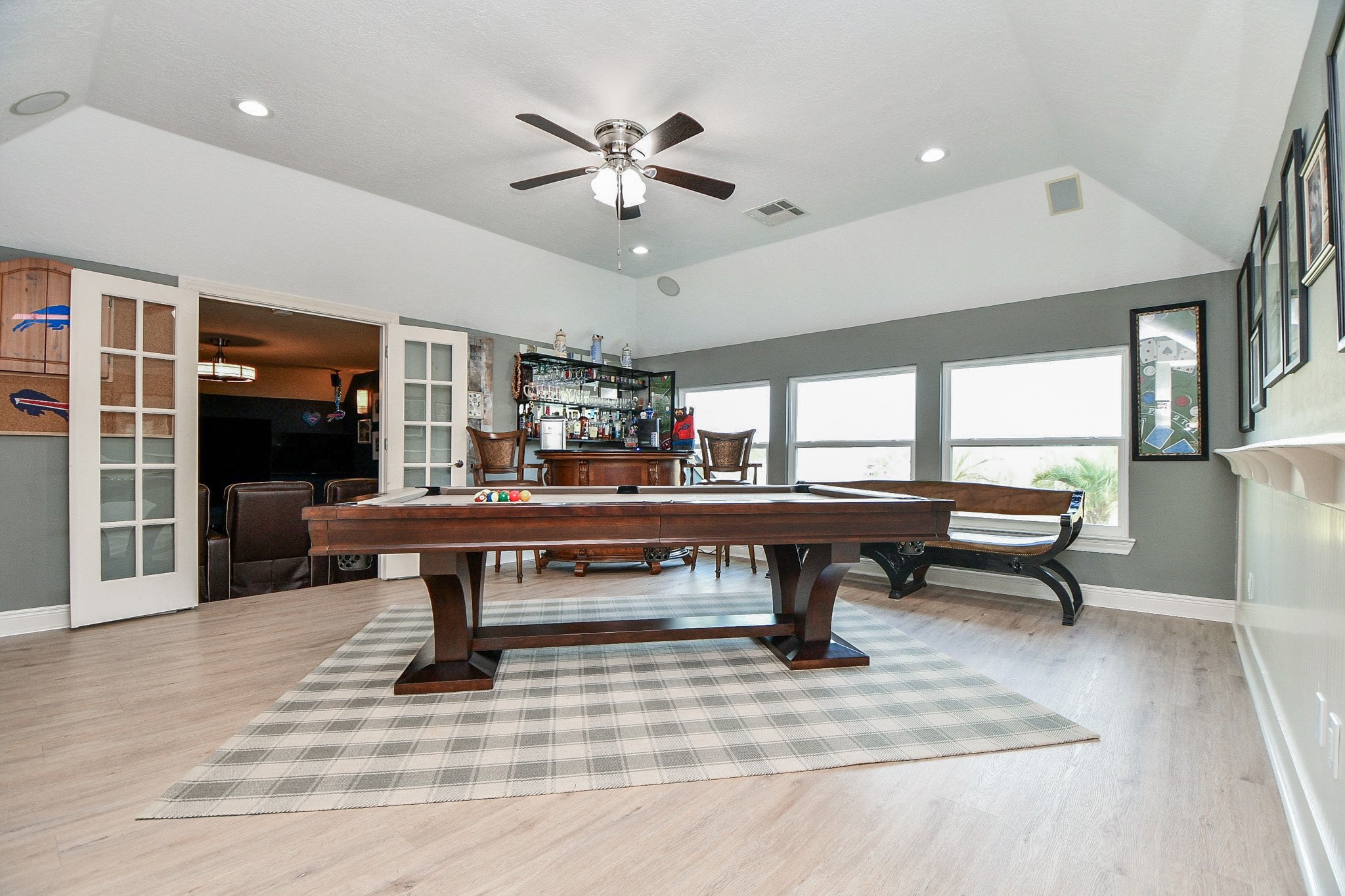 3680 Eula Morgan Road Katy, TX 77493 - Photo 27 of 50 The huge, streamlined 2nd floor game room is replete with its signature pool table, in this view. High, tray inspired ceiling embraces huge wall, floor and window space. At left, is the entrance to your private, cozy media room.