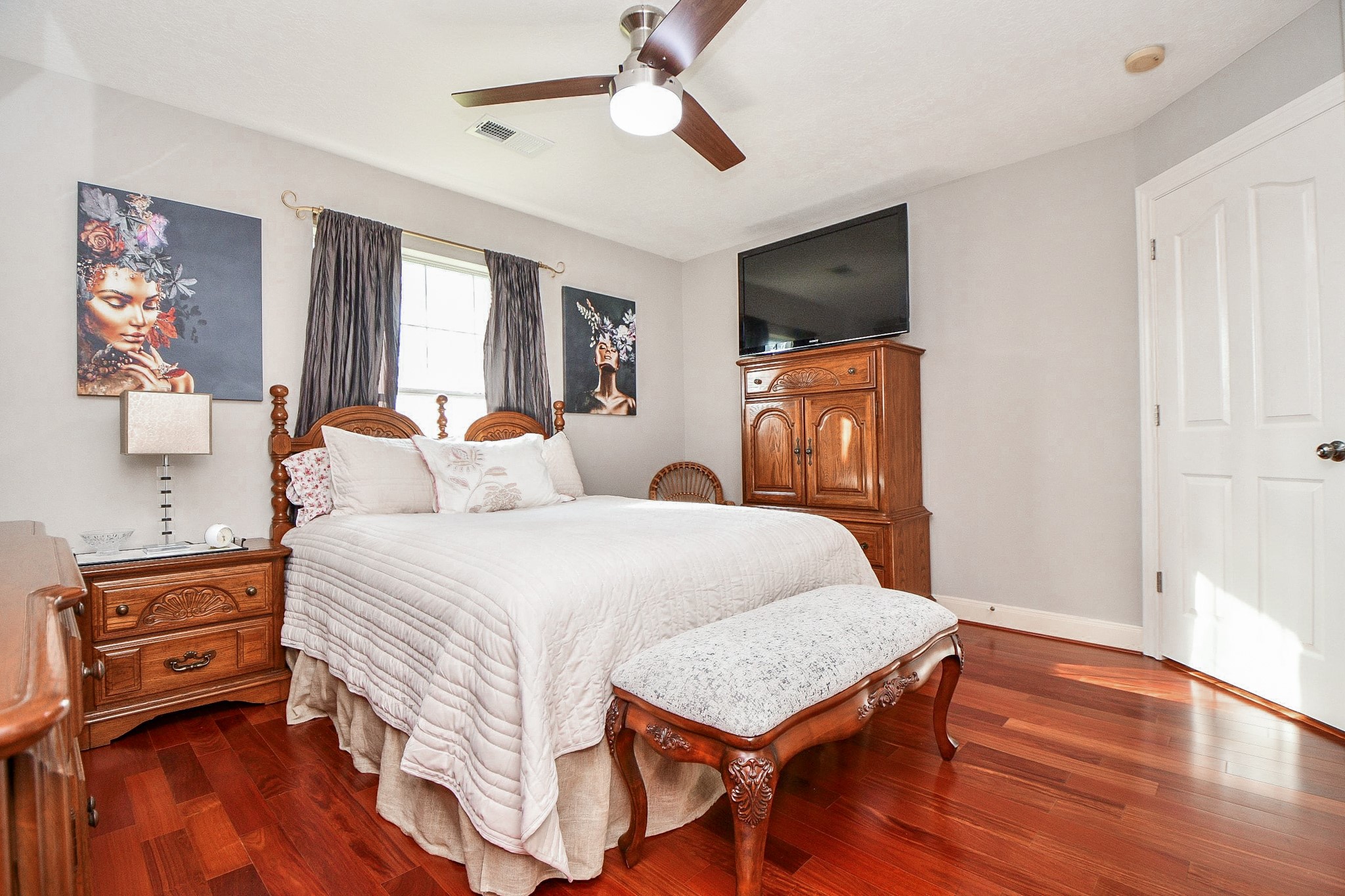 3680 Eula Morgan Road Katy, TX 77493 - Photo 31 of 50 a bedroom with a bed and wooden floor