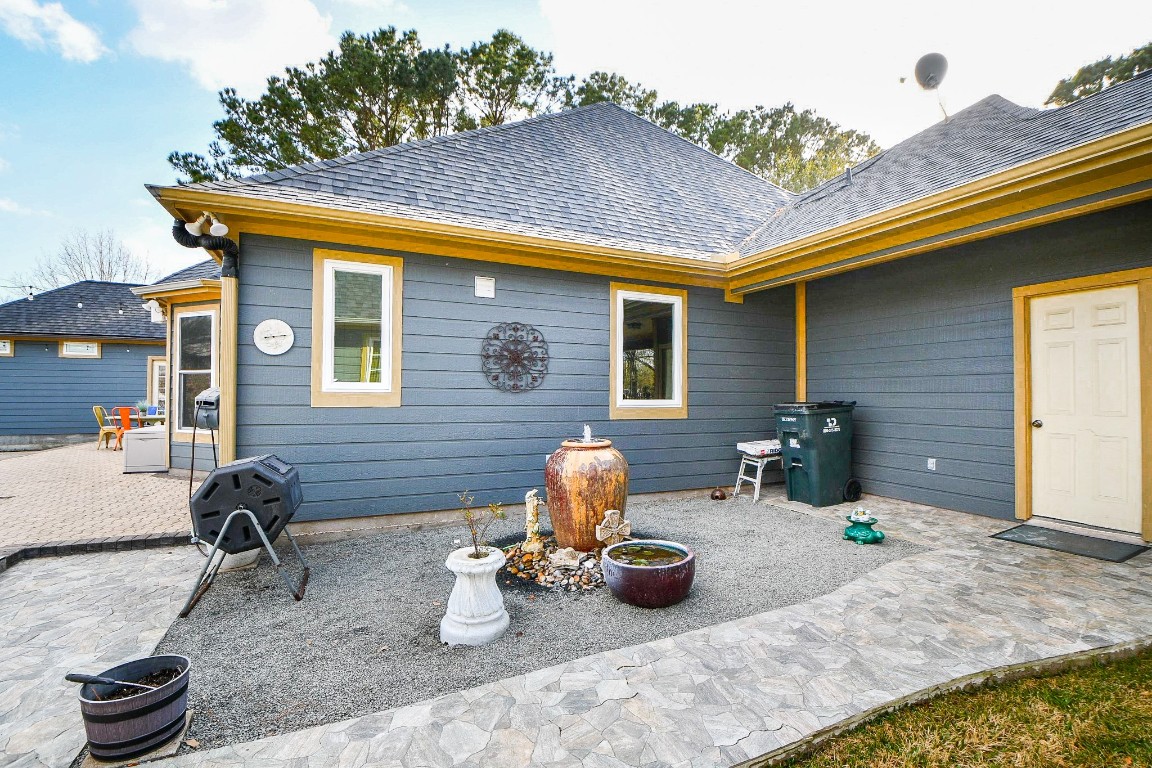 3680 Eula Morgan Road Katy, TX 77493 - Photo 37 of 50 Off the 11' x 18' breezeway between the main house and Guesthouse is this area. Relaxing sound of the fountain. Behind is more entertaining area.