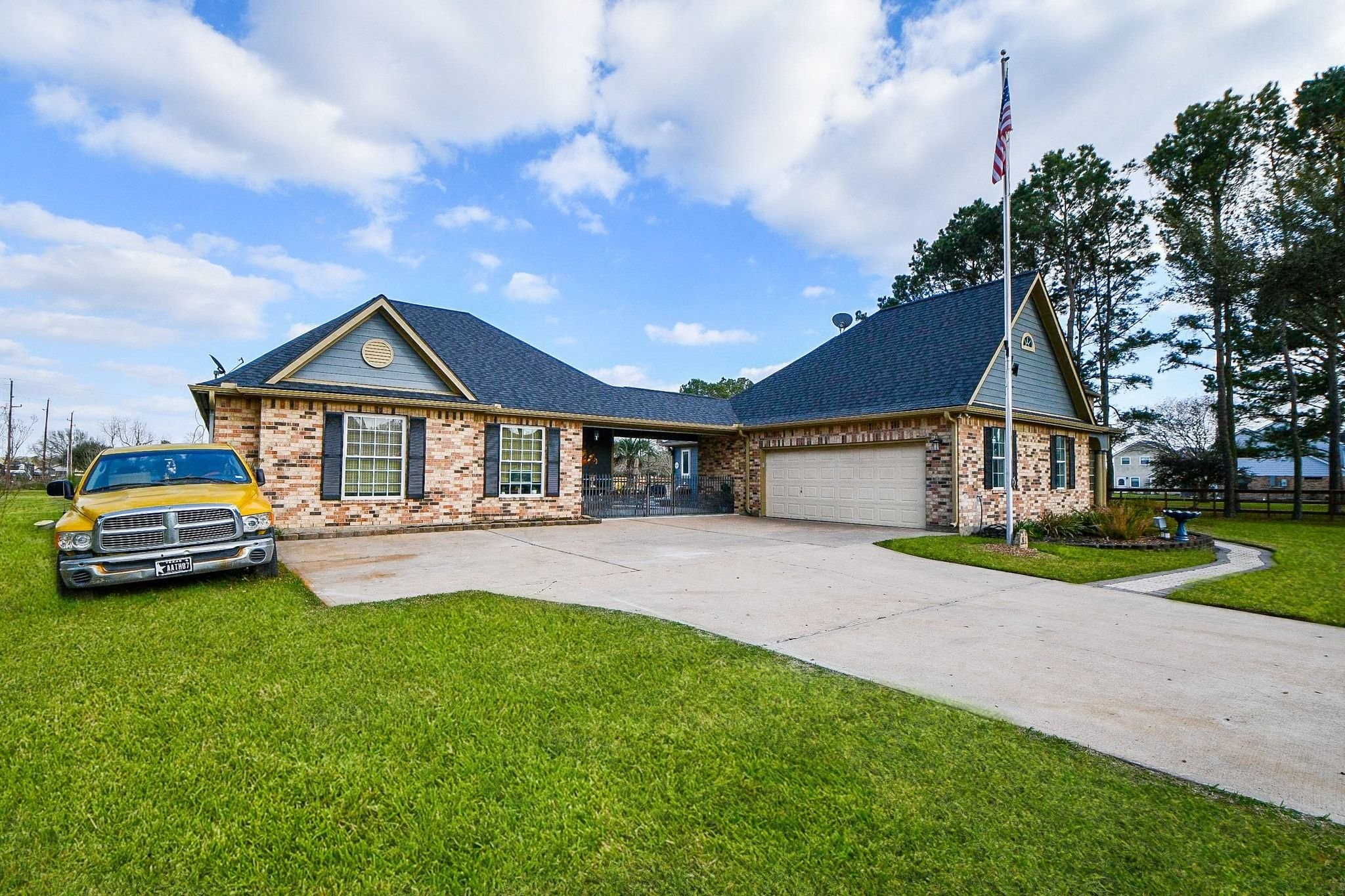 3680 Eula Morgan Road Katy, TX 77493 - Photo 39 of 50 a front view of a house with a yard and garage
