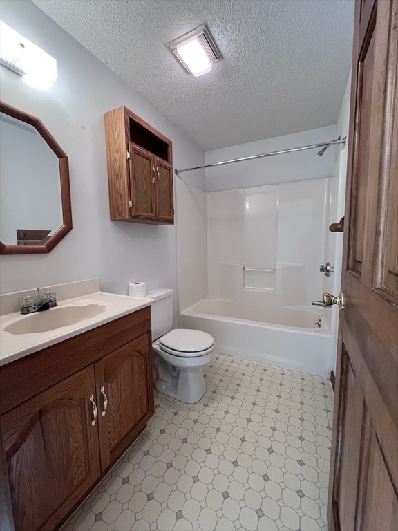 48 Peekskill Avenue Springfield, MA 01129 - Photo 15 of 23 a bathroom with a sink a toilet and shower