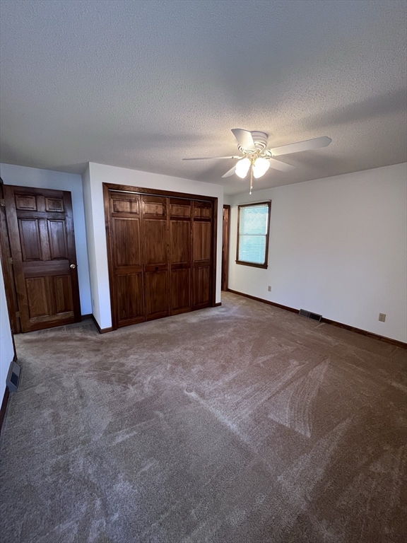 48 Peekskill Avenue Springfield, MA 01129 - Photo 17 of 23 a view of empty room with a fireplace
