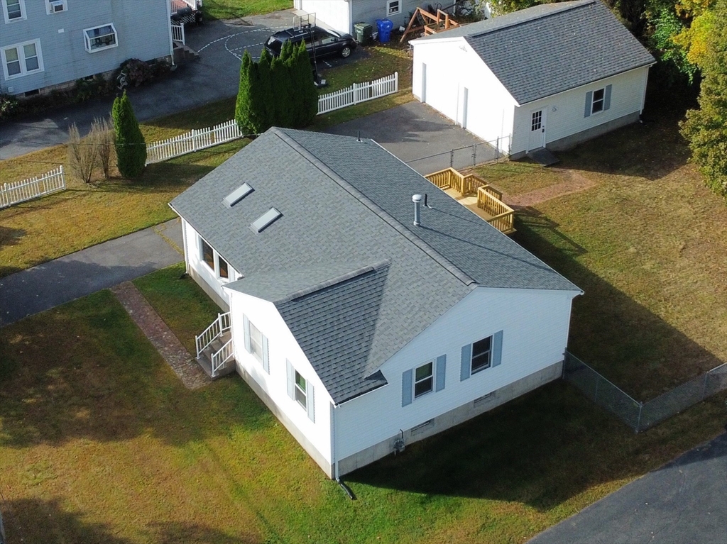 48 Peekskill Avenue Springfield, MA 01129 - Photo 2 of 23 a view of a house with a yard