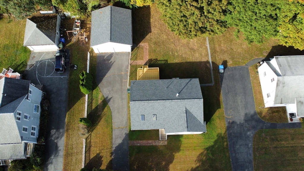 48 Peekskill Avenue Springfield, MA 01129 - Photo 3 of 23 an aerial view of a house with a yard
