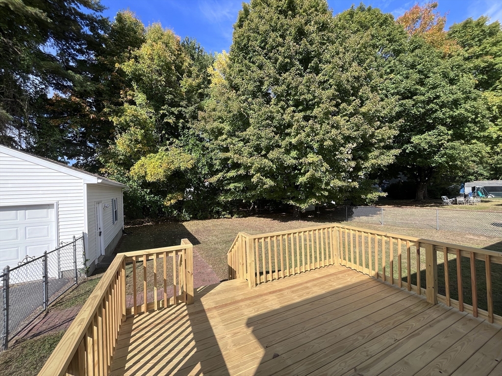 48 Peekskill Avenue Springfield, MA 01129 - Photo 10 of 23 a view of deck and deck with wooden floor and fence