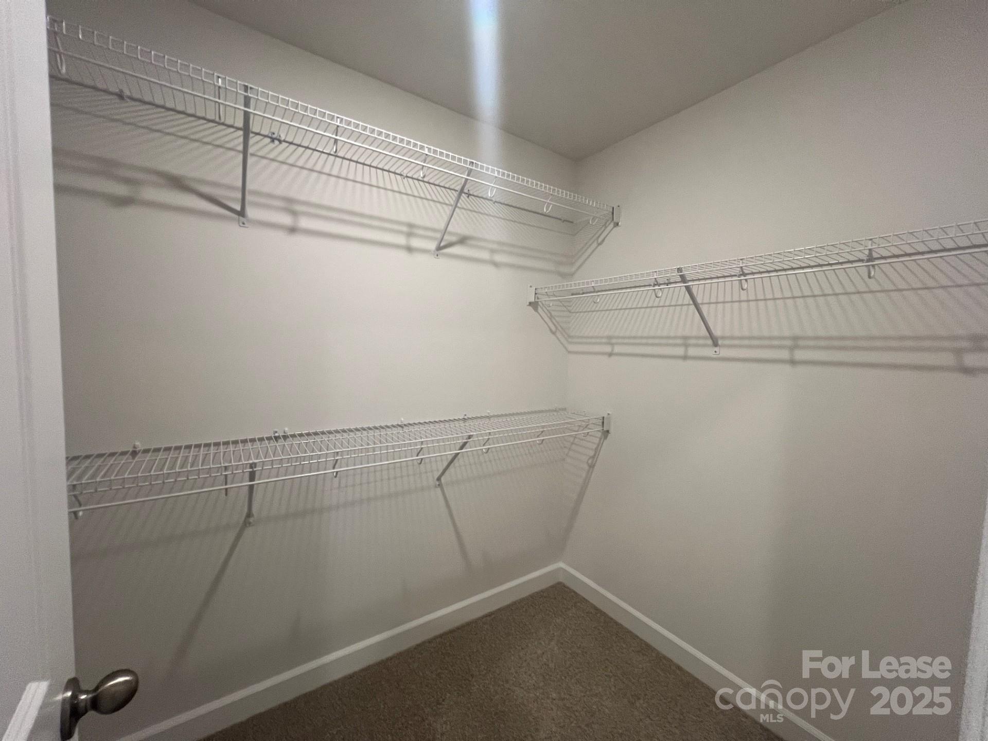 1241 30th St Lane Northeast Conover, NC 28613 - Photo 11 of 19 a view of a room with racks on the wall