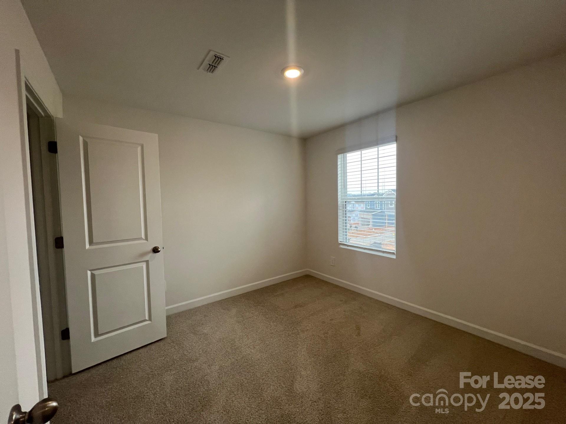 1241 30th St Lane Northeast Conover, NC 28613 - Photo 13 of 19 an empty room with windows