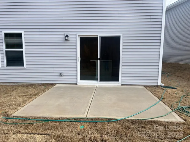 a view of a house with a garage