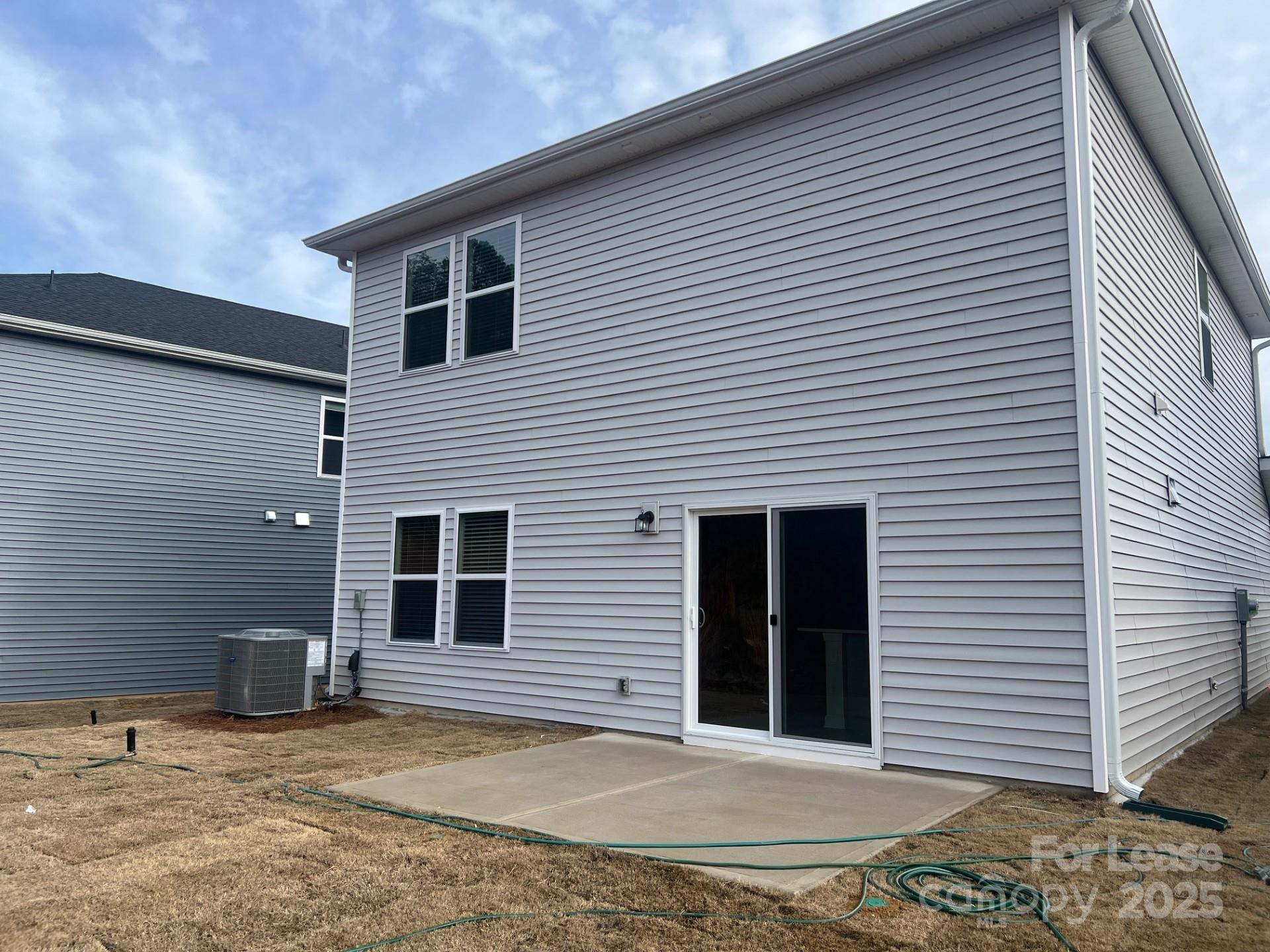 1241 30th St Lane Northeast Conover, NC 28613 - Photo 17 of 19 a view of a house with a backyard