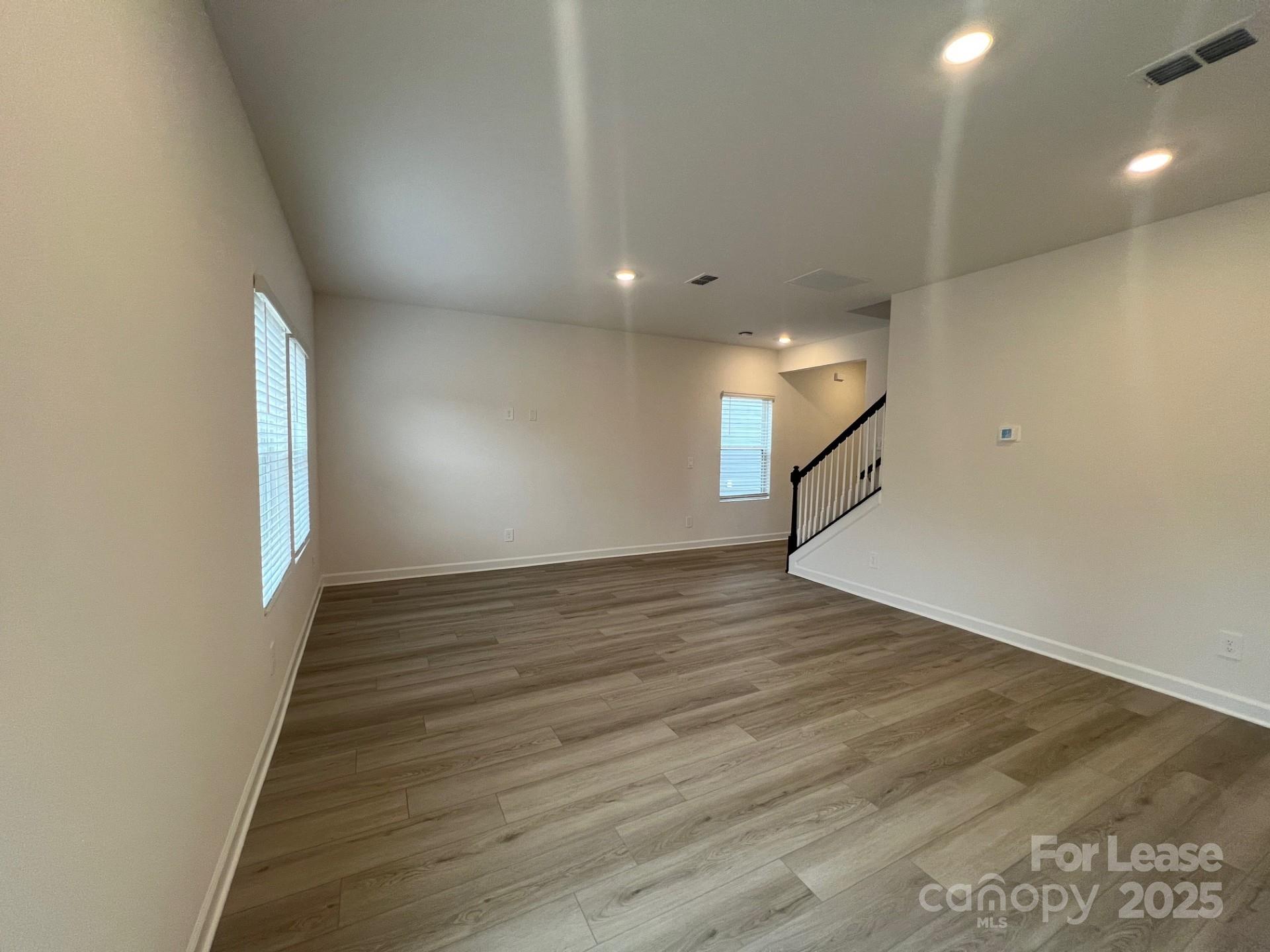 1241 30th St Lane Northeast Conover, NC 28613 - Photo 6 of 19 a view of empty room with wooden floor