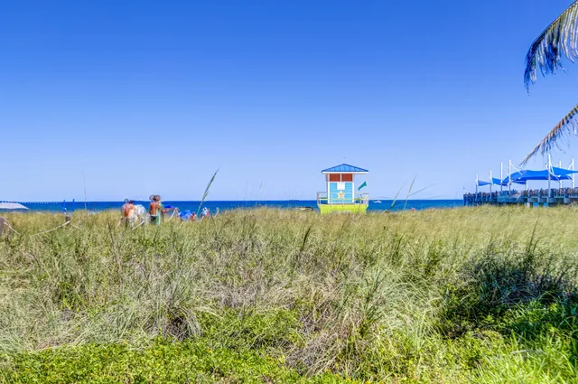 a view of swimming pool with outdoor seating