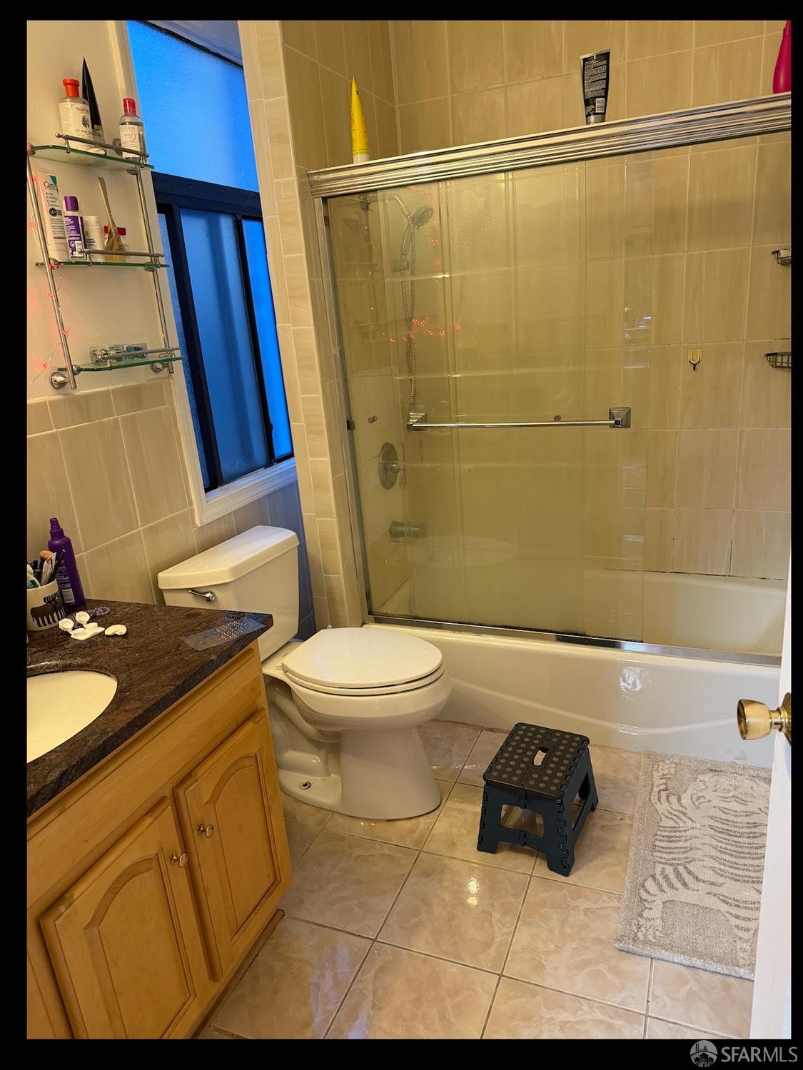 247 Brighton Avenue San Francisco, CA 94112 - Photo 10 of 11 a bathroom with a sink a toilet and shower