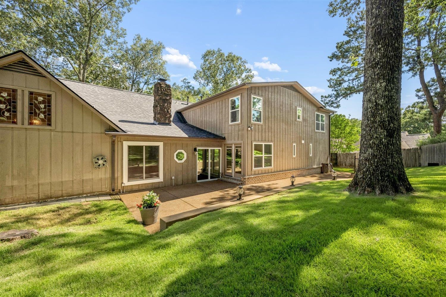 8970 Farmoor Road Germantown, TN 38139 - Photo 33 of 35 Expansive backyard with a concrete patio