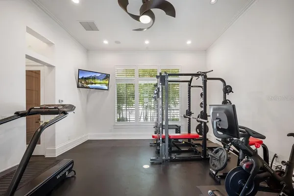 a view of a house with a yard patio and swimming pool