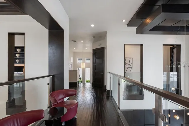 a view of a patio with a table and chairs