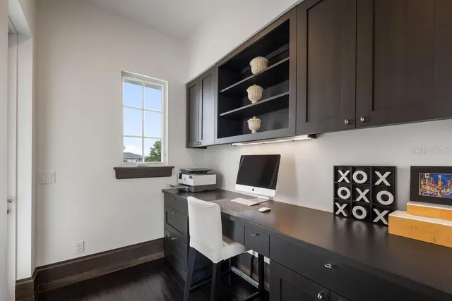 a view of swimming pool with chairs