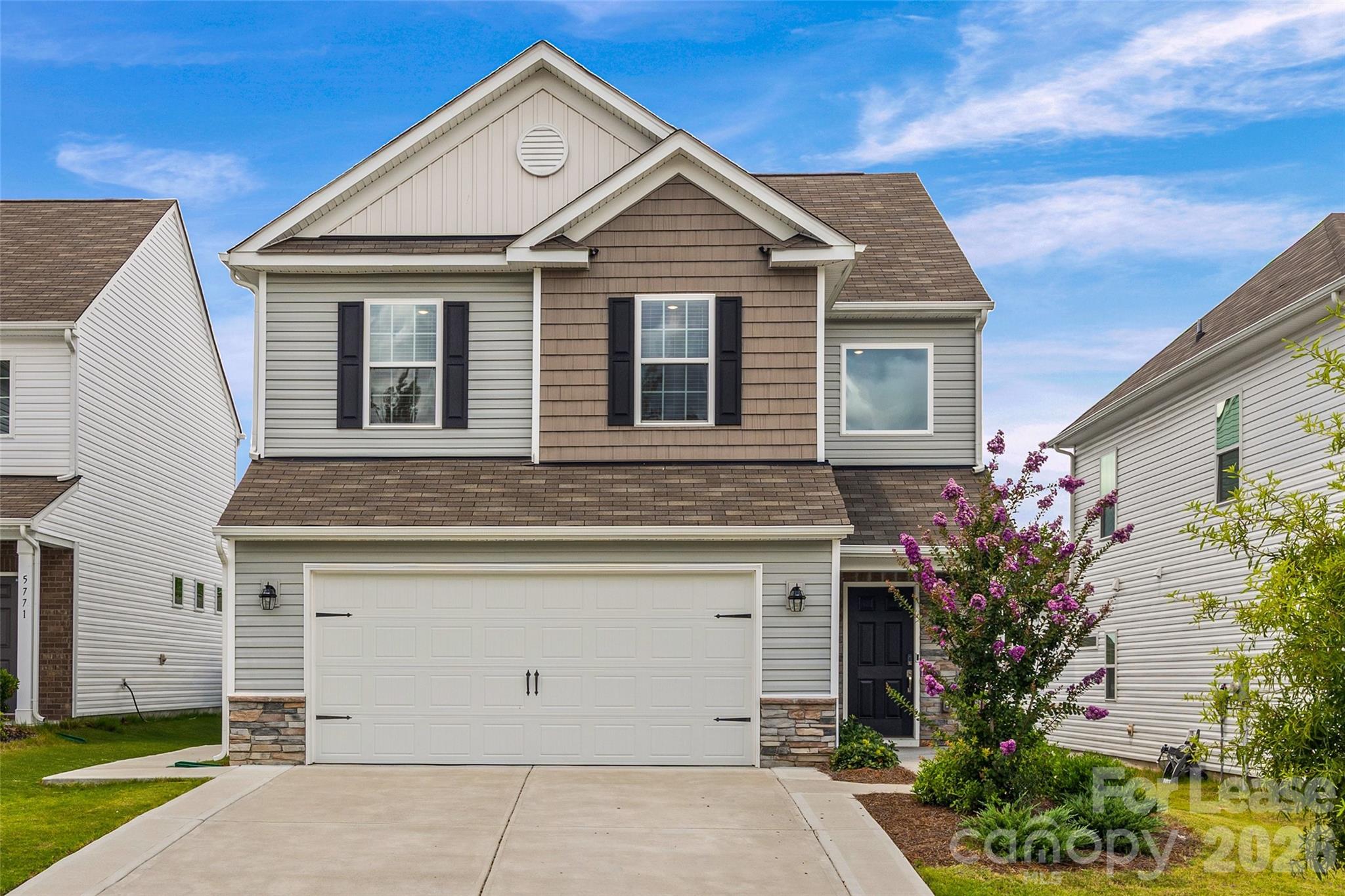 5775 Soft Shell Drive Lancaster, SC 29720 - Photo 1 of 40 a front view of a house with a garden