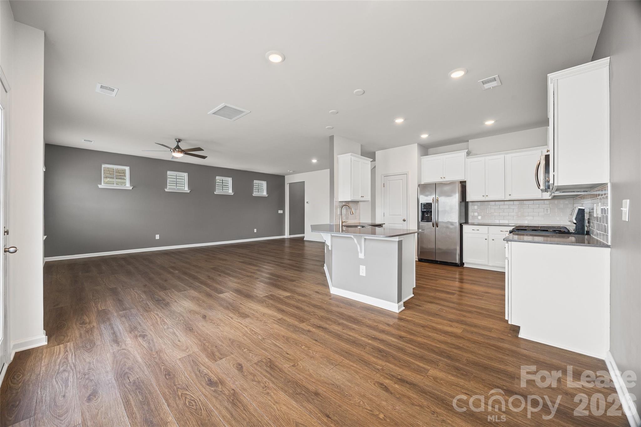 5775 Soft Shell Drive Lancaster, SC 29720 - Photo 13 of 40 a view of kitchen with wooden floor