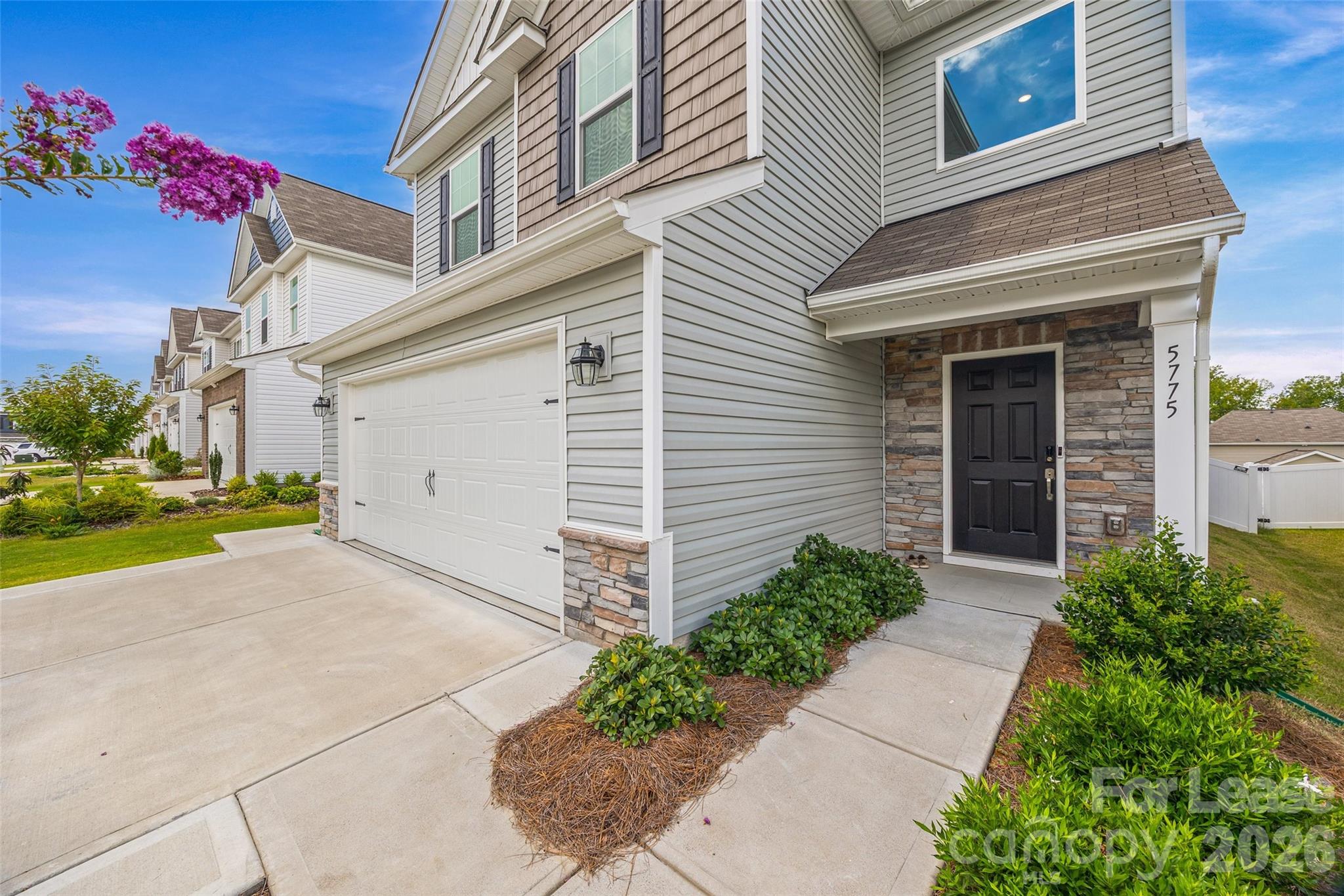 5775 Soft Shell Drive Lancaster, SC 29720 - Photo 3 of 40 a front view of a house with garden