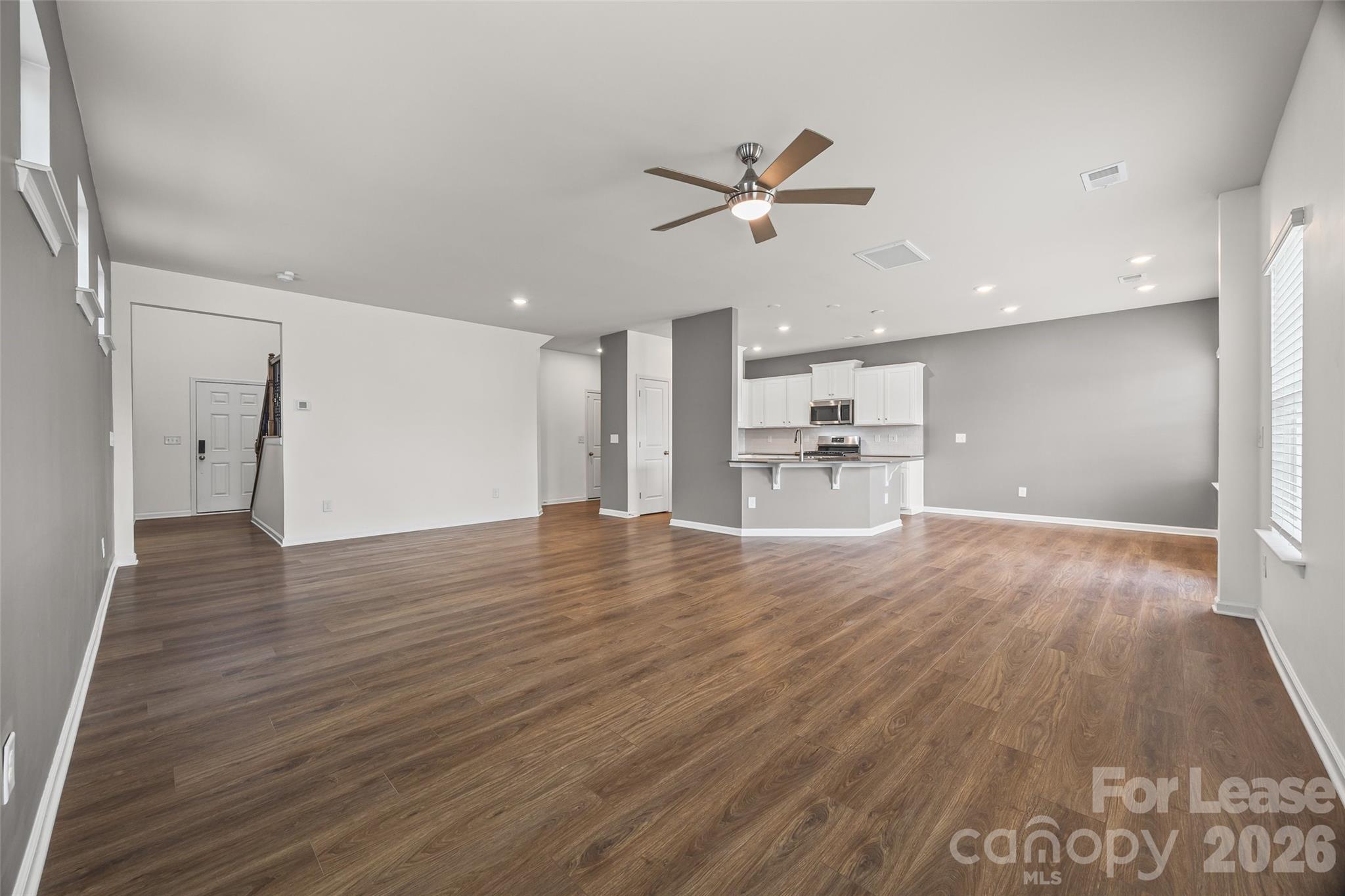 5775 Soft Shell Drive Lancaster, SC 29720 - Photo 7 of 40 a view of empty room with wooden floor and window