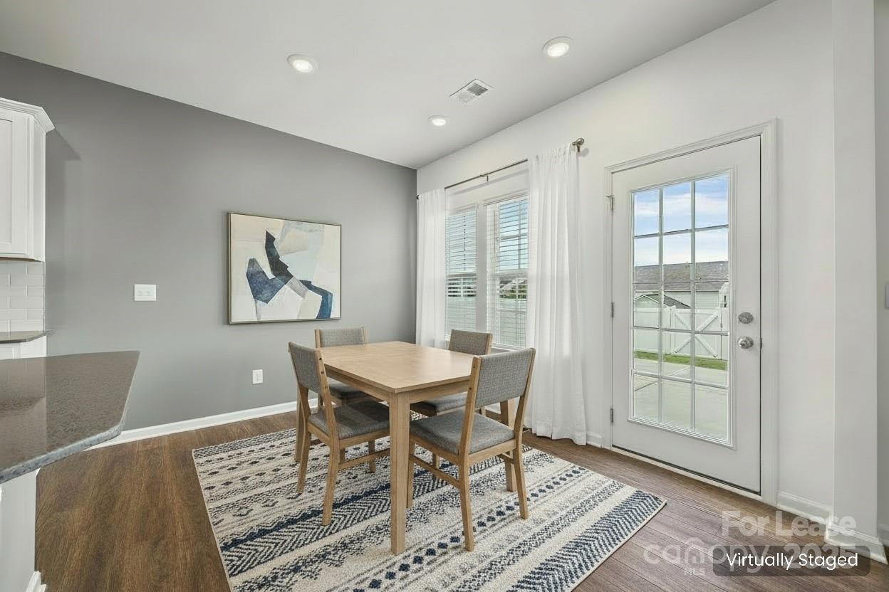 5775 Soft Shell Drive Lancaster, SC 29720 - Photo 10 of 39 a view of a dining room with furniture