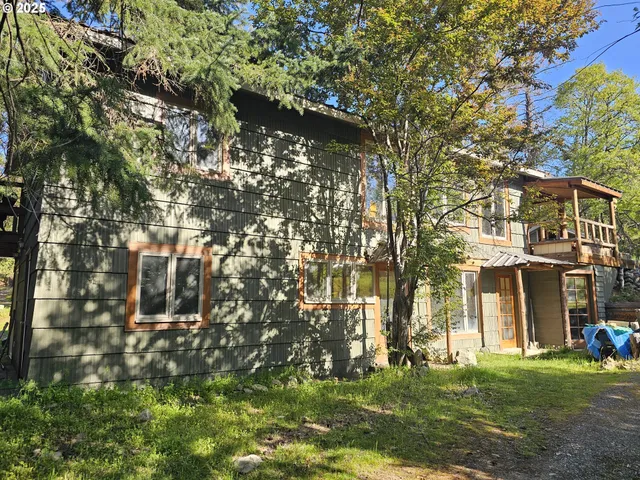 front view of a building with a yard