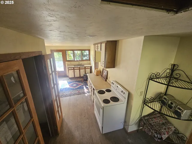 a view of a hallway with workspace