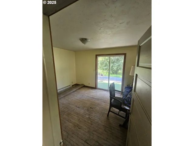 a living room with furniture and a gate
