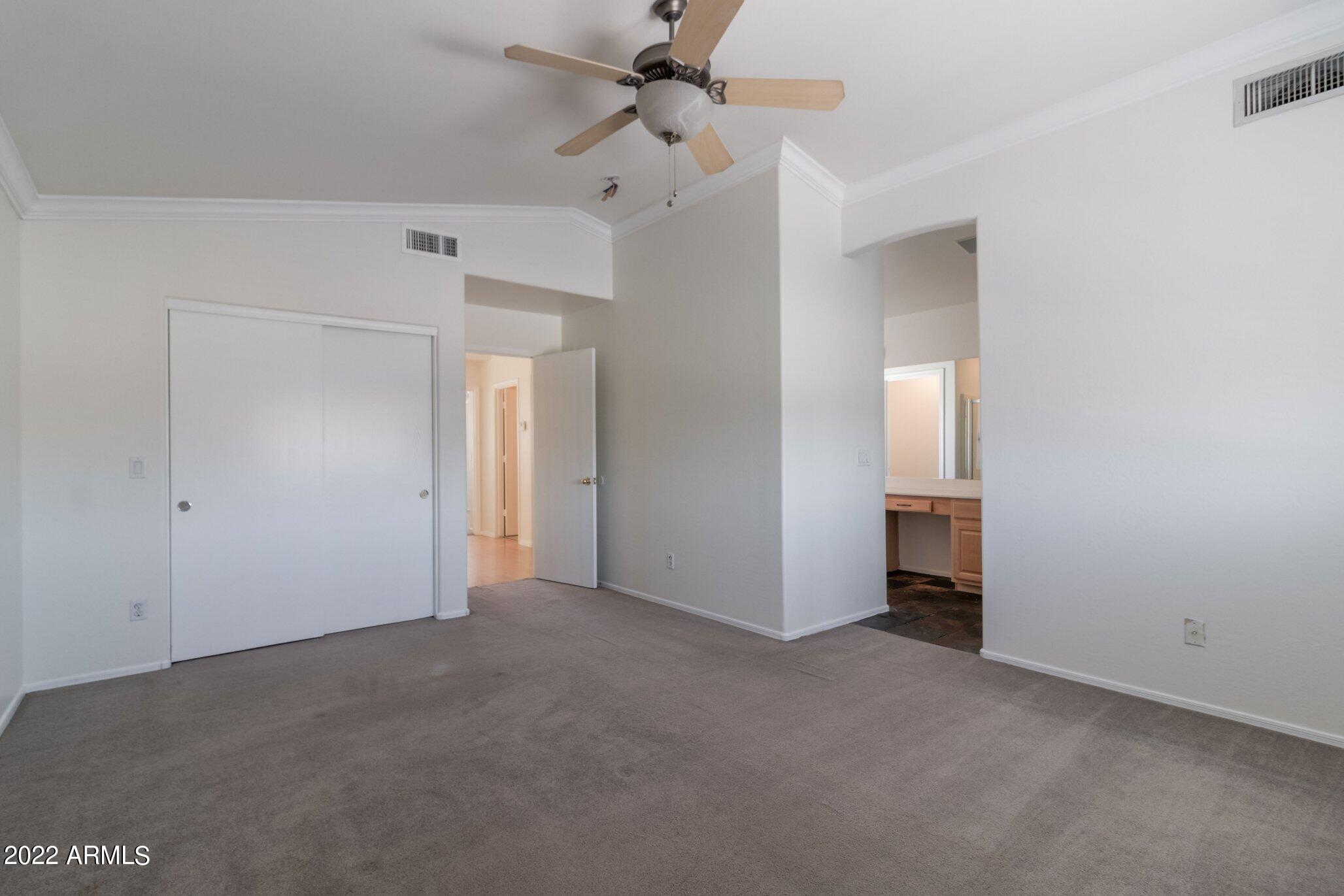 16784 West Southampton Road Surprise, AZ 85374 - Photo 30 of 33 Master Bedroom