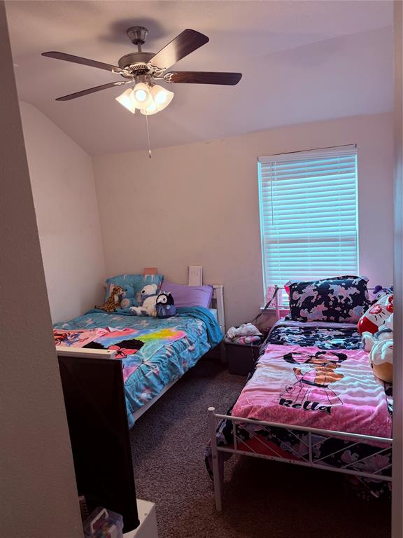 2001 Juniper Pass Way Mesquite, TX 75149 - Photo 7 of 12 Bedroom with ceiling fan and dark carpet