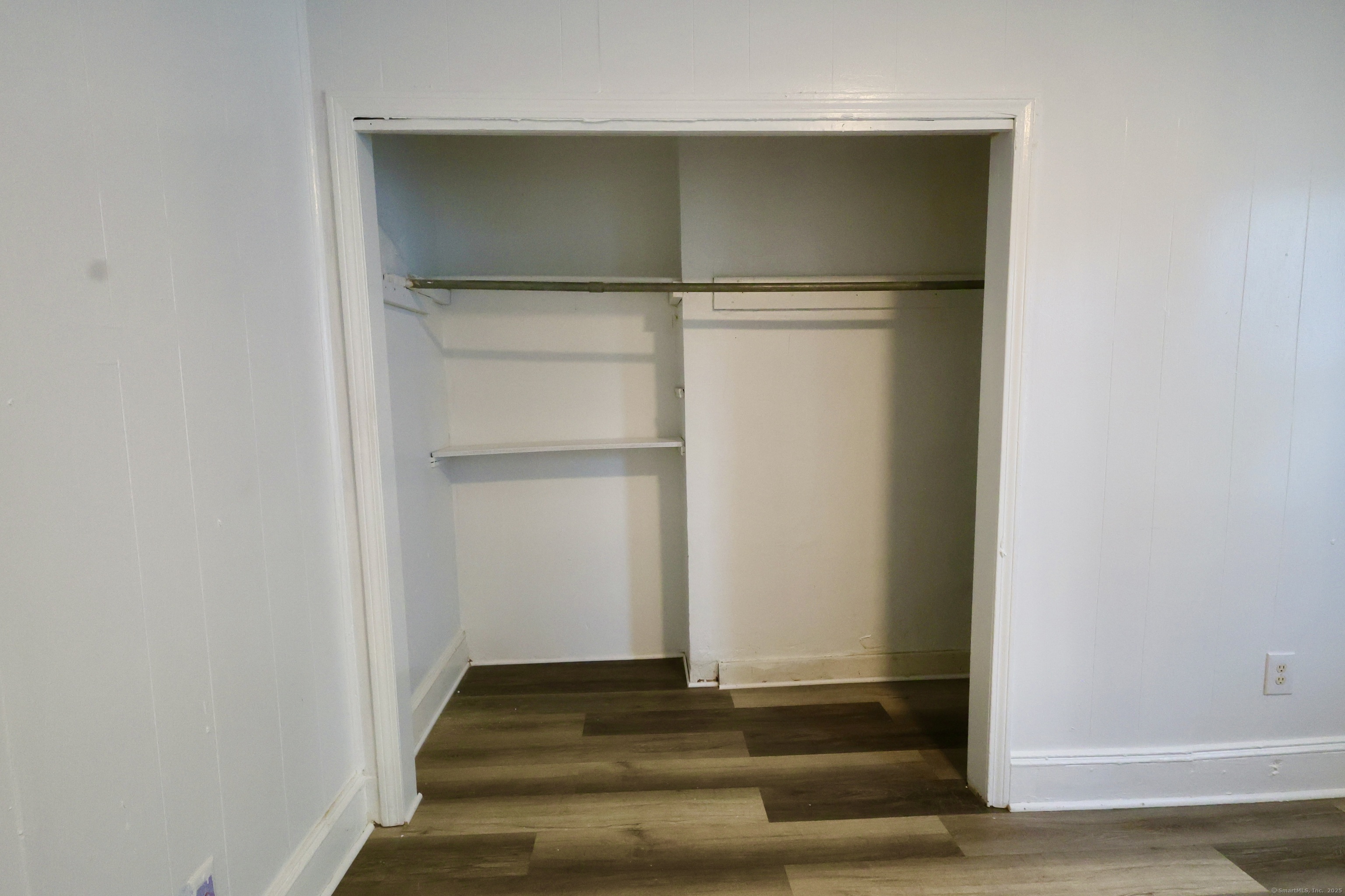 660 West Main Street New Britain, CT 06053 - Photo 12 of 26 a view of an empty room with wooden floor