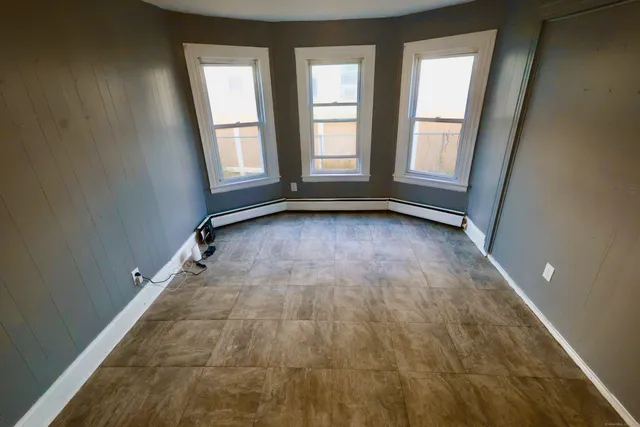 an empty room with windows