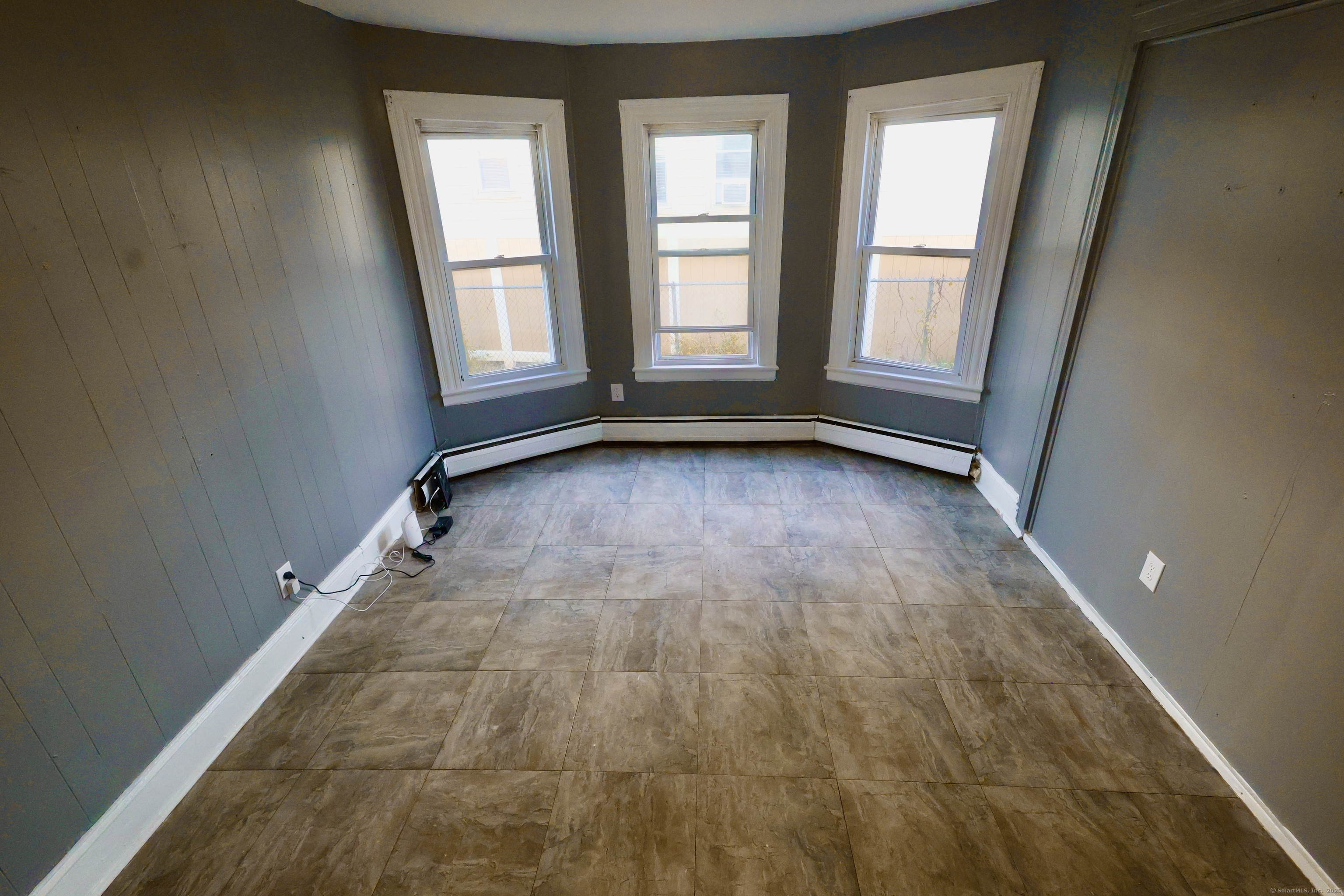 660 West Main Street New Britain, CT 06053 - Photo 7 of 26 an empty room with windows