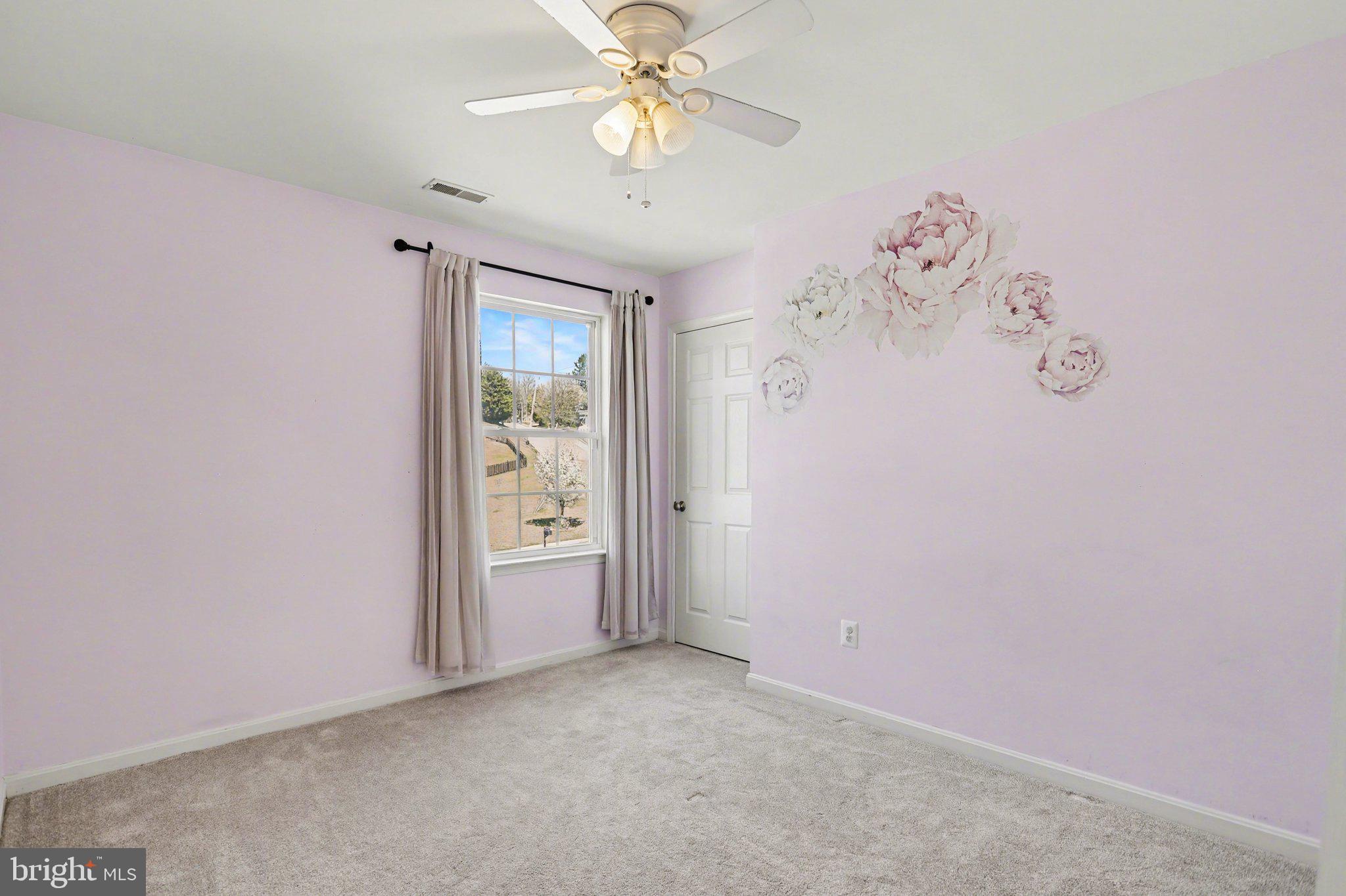 503 Windy Way New Cumberland, PA 17070 - Photo 19 of 29 an empty room with windows and fan