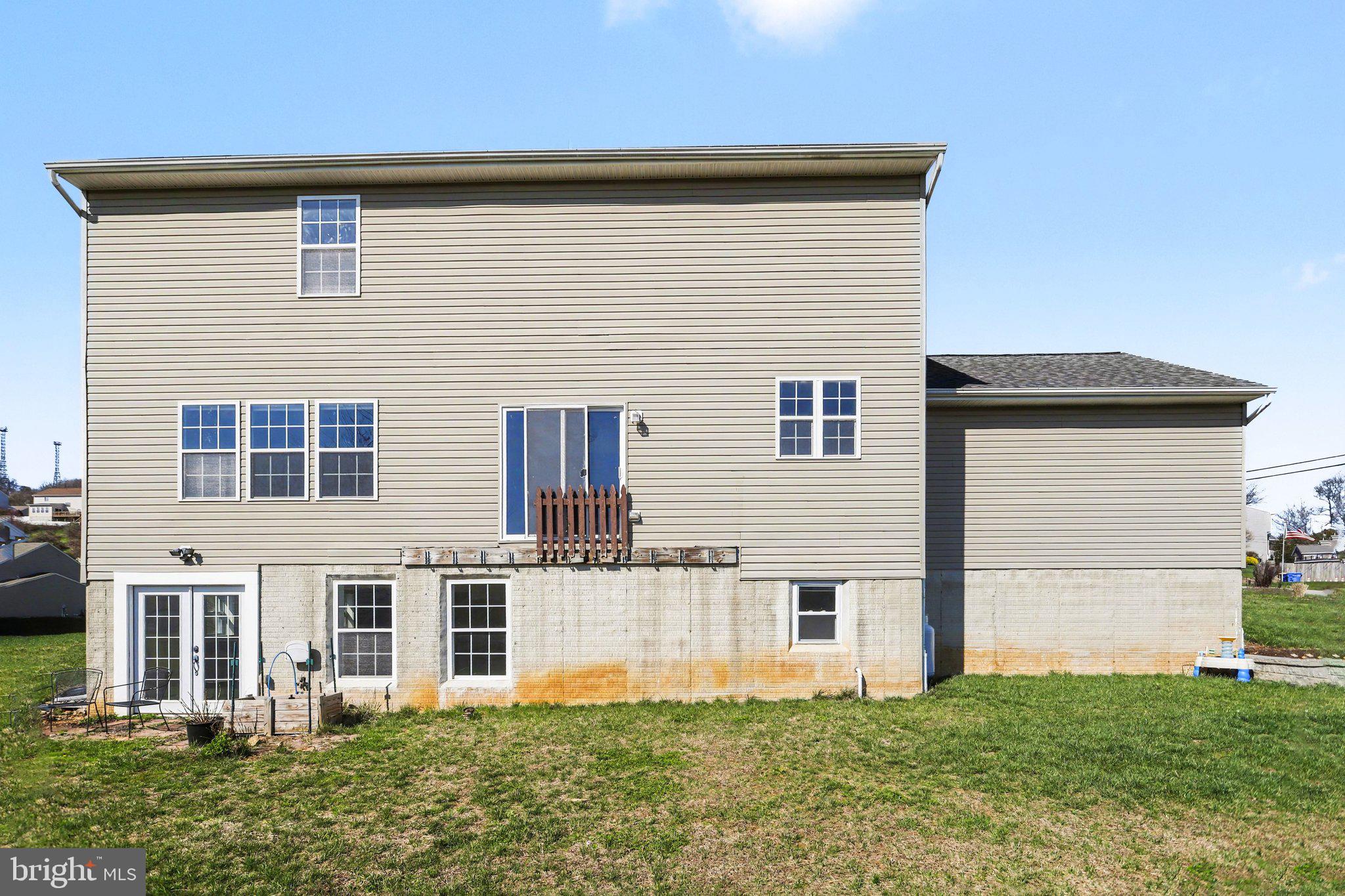 503 Windy Way New Cumberland, PA 17070 - Photo 24 of 29 a front view of a house with a yard