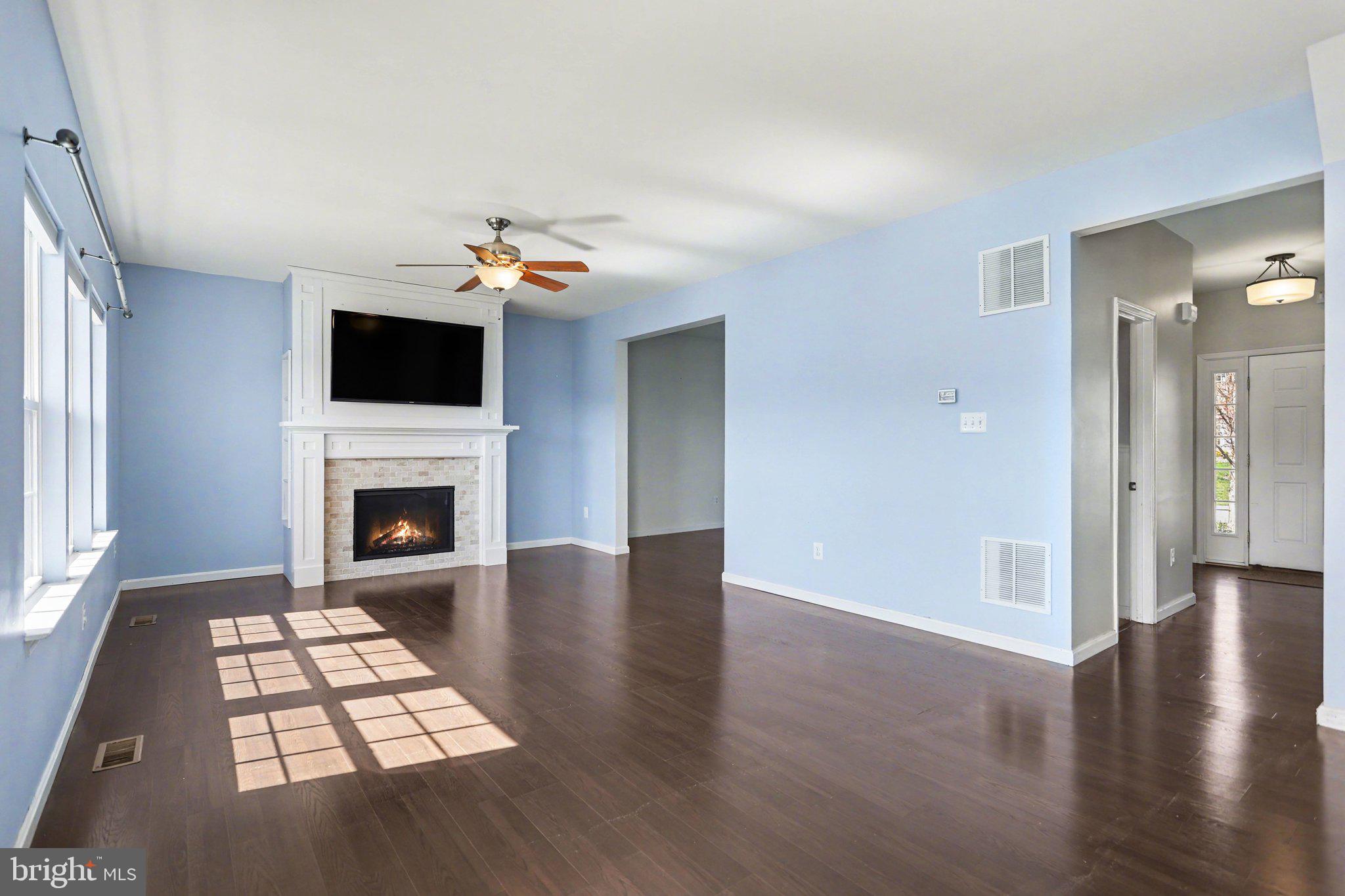503 Windy Way New Cumberland, PA 17070 - Photo 9 of 29 a view of a livingroom with a fireplace a window and a fireplace