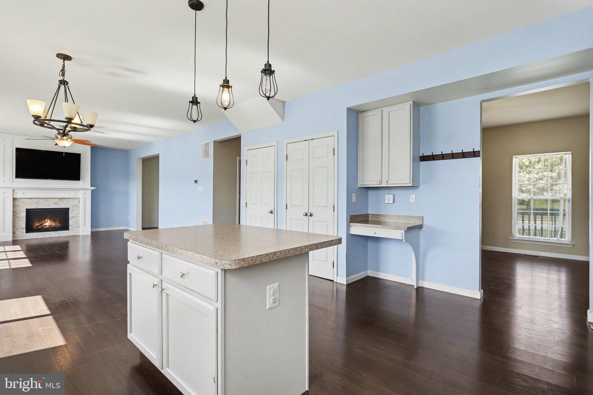 503 Windy Way New Cumberland, PA 17070 - Photo 10 of 29 a kitchen with kitchen island white cabinets and stainless steel appliances